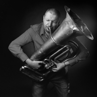 Portrait of a musician with tuba