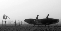 Surfers on a Foggy Day