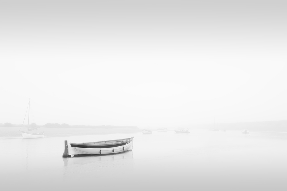Lone Boat at Dawn in the Mist