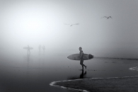 Surfer in the fog