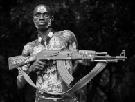 Karo man with his Kalashnikov