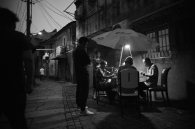  People playing cards after dinner