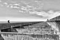 Pier and fisherman